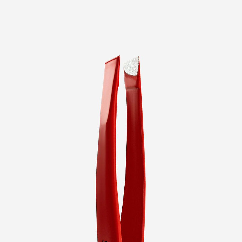 close-up of sharp sides of STALEKS Eyebrow Tweezers Pro Expert 11 Type 3R (Wide Slant, Red)