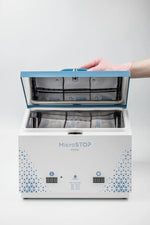 MicroSTOP MAXI steriliser front view with open lid and interior tray
