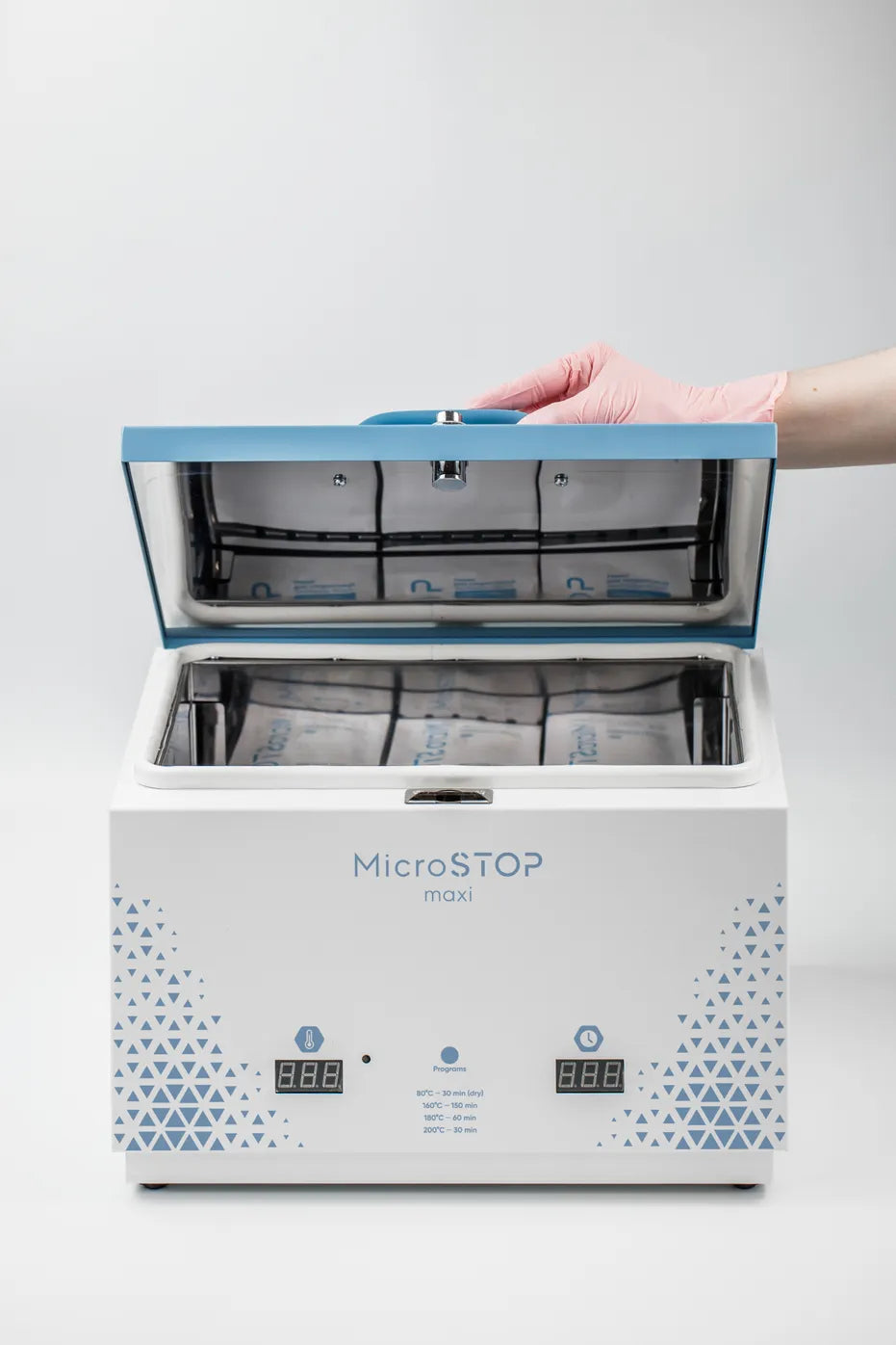MicroSTOP MAXI steriliser front view with open lid and interior tray