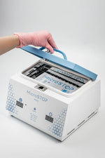 MicroSTOP MINI steriliser opened with pouch loaded inside